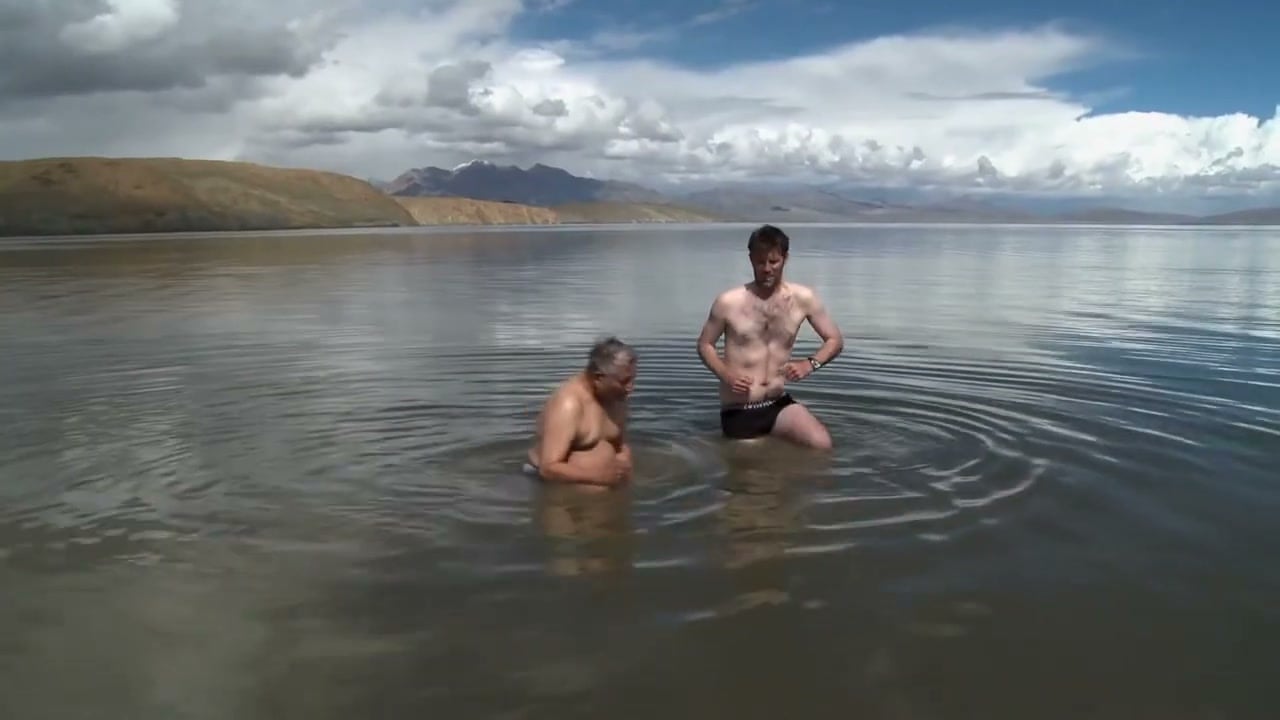 Buddhist pilgrims prostrating around Mt. Kailash